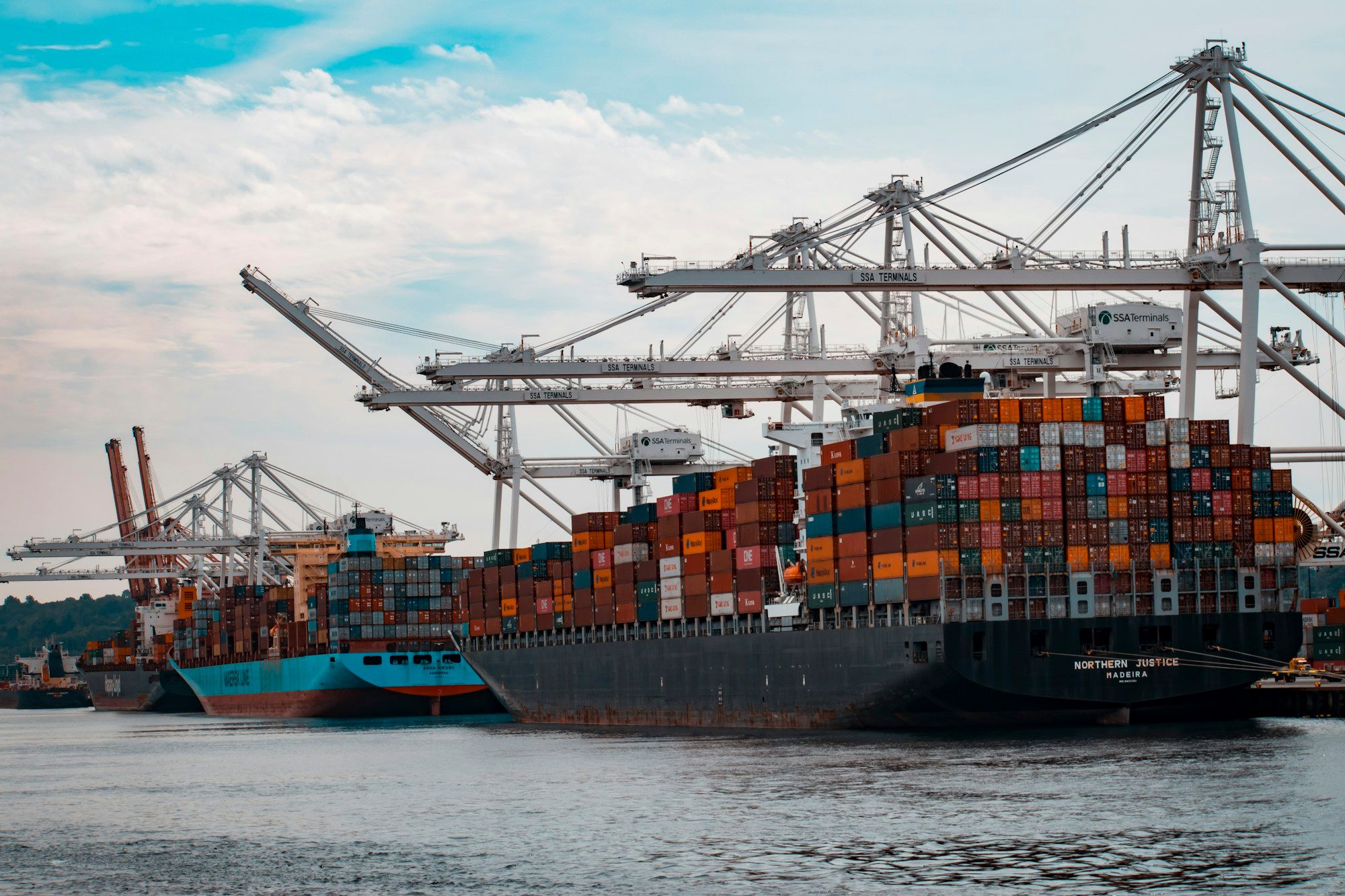 Container vessel loading at an international port